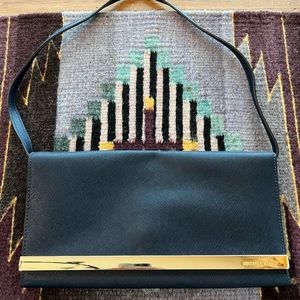 Michael Kors navy blue clutch/shoulder bag with gold detailing